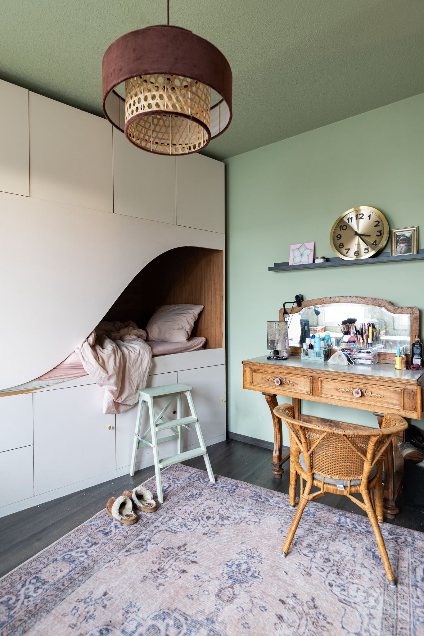 Sage green bedroom with built-in bed