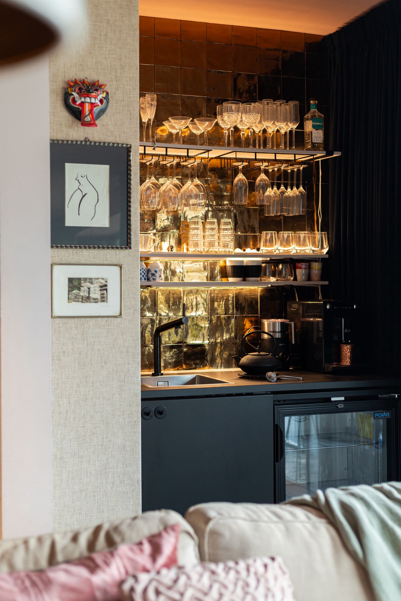 Dining area with organic wood sculpture wall